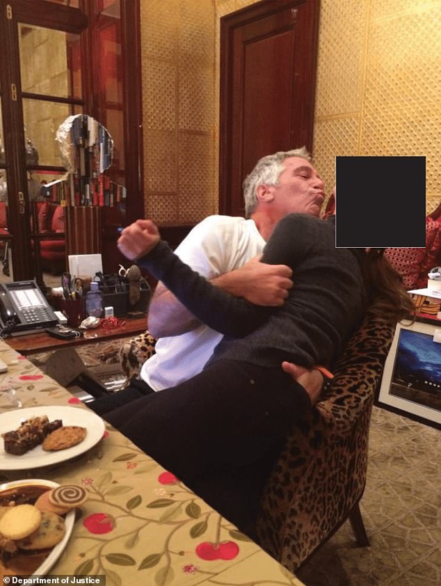 Epstein kisses an unknown girl in this image recently released by the DOJ