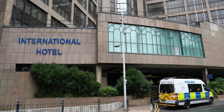 Asylum hotel migrant in his 20s arrested over assault after 'entering woman's flat' is cleared due to lack of evidence