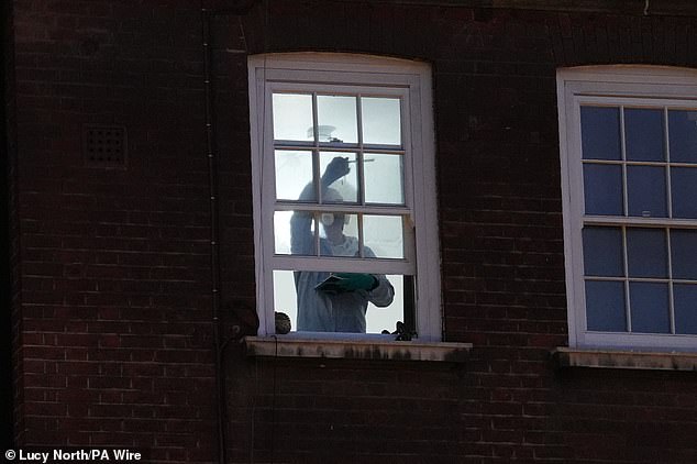 forensic investigator was seen working at the window of a property today following the tragic death of an 18-day-old baby girl. The infant died after falling from a height