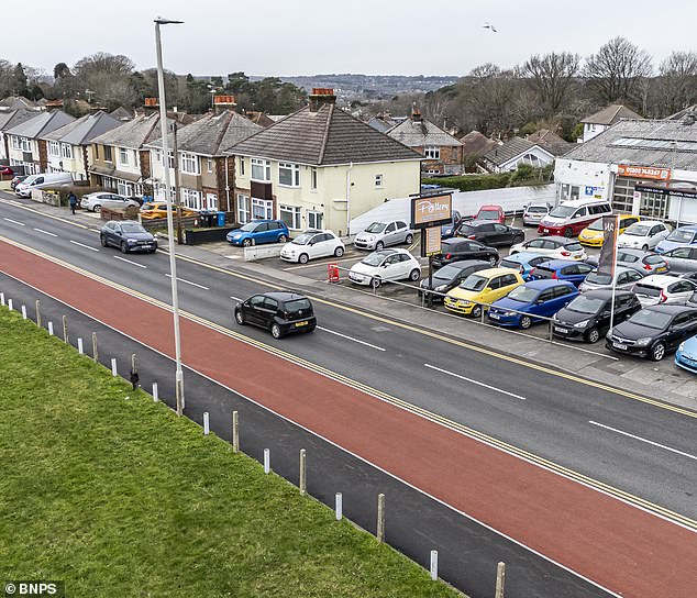 Under the new scheme, extended pavement 'build-outs' at junctions force vehicles emerging from side roads into sharp, near-right-angle turns. This often causes drivers to swing out into the oncoming lane to complete the manoeuver