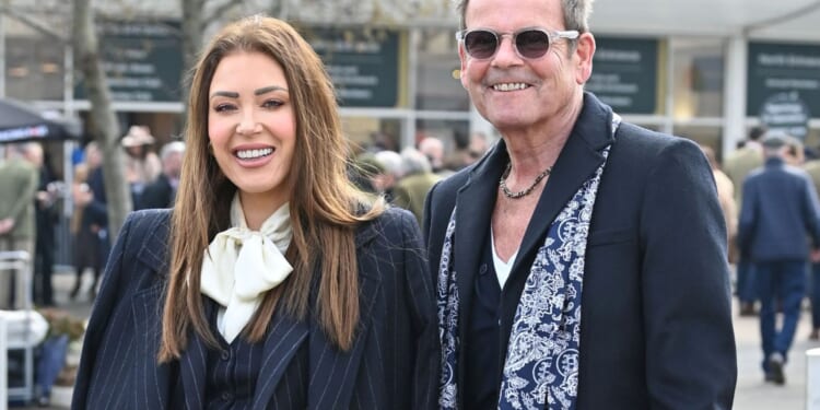 Lorna Luxe reveals 'sign' from late husband John as she puts on a brave face at Cheltenham Festival after his death