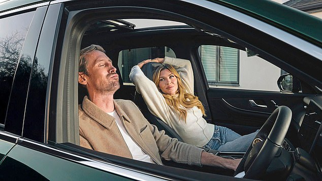 Pictured: Peter Crouch and his wife Abbey Clancy in an advert for the Denza Z9GT