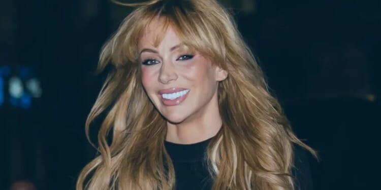 Beaming Olivia Attwood shows off endless legs in miniskirt as ex Bradley Dack ditches wedding ring