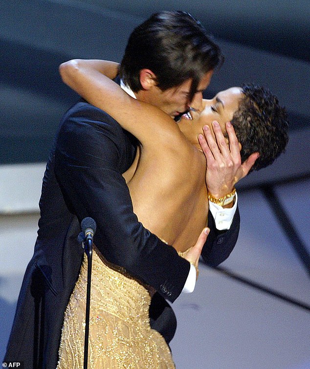 Out of nowhere Adrien Brody dipped Halle Berry and planted a passionate kiss on her during the 2003 Oscars