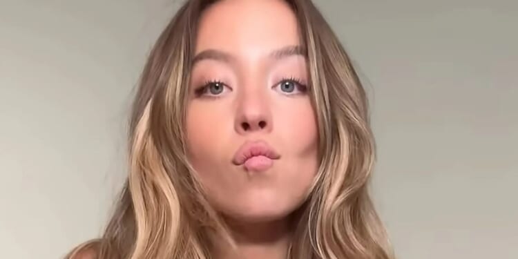 Busty Sydney Sweeney pouts as she poses in underwear from her booming lingerie label