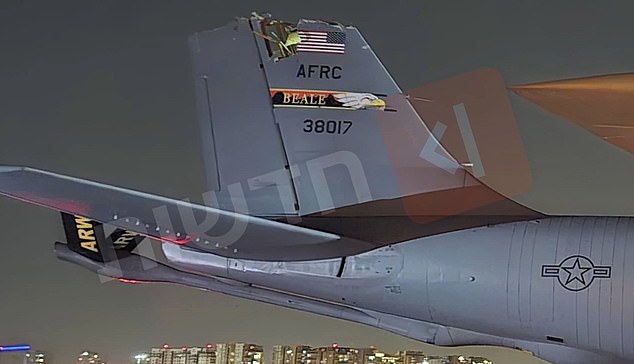 The KC-135 refueling plane went down on Thursday in  'friendly airspace' and a second aircraft involved in the incident landed safely. Picture shows the second aircraft with damage to its tail
