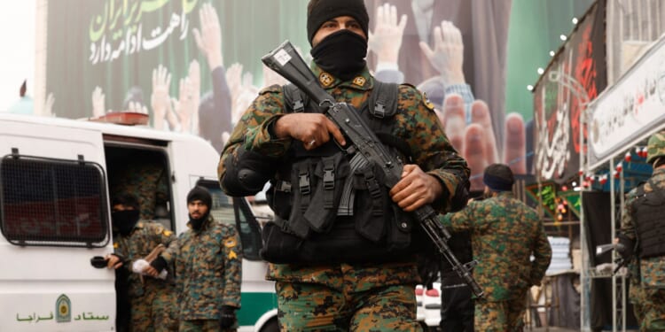 Iran ramps up terror on streets with teens forced to run checkpoints & gun patrols as cowering top brass hide in schools