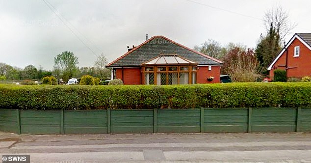 The couple's 25-metre long grey fence replaced a nine-foot high hedge which had become difficult and expensive to maintain due to their age and disabilities