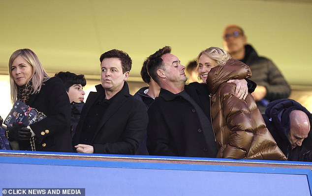 They celebrated with the other fans in the stands