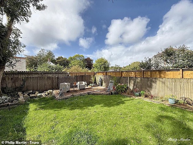 The corner of a garden in Grampound is for sale for £45,000 and comes with off-road parking