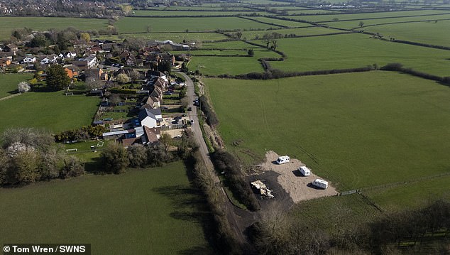 Some locals who were protesting at the site (pictured), which is in a conservation area, claim they were approached by two men from inside the camp who said that if they wanted them to leave the area, they could buy the land back for more than £600,000