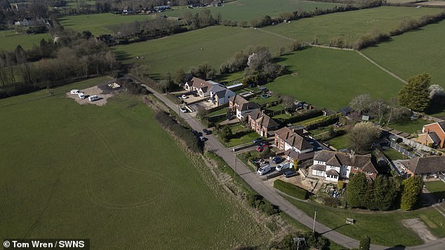 Similar-sized, quarter-of-an-acre plots on the site (pictured) had originally been bought for around £15,000, it is claimed