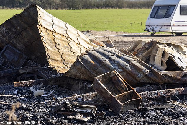 The structure was burnt to the ground on March 3, which Thames Valley Police has confirmed they are investigating. Pictured: The burnt-out remains of the static home