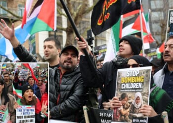 Thousands of pro-Iran protesters gather for Al-Quds 'hate march' in central London despite ban with riot cops on standby