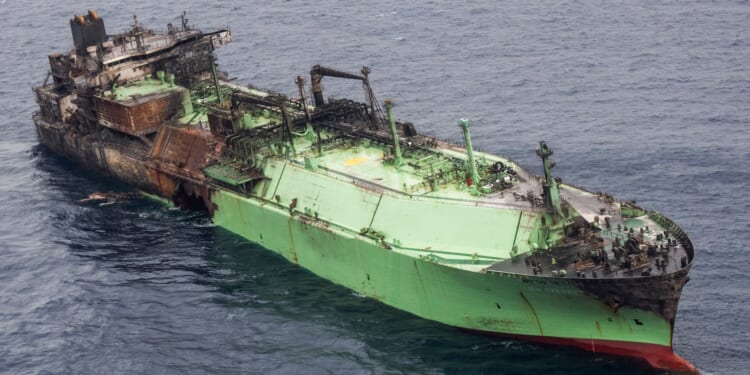 Shock pictures show Putin's charred ‘shadow fleet’ tanker drifting with no crew after blitz by Ukraine's Sea Baby drones