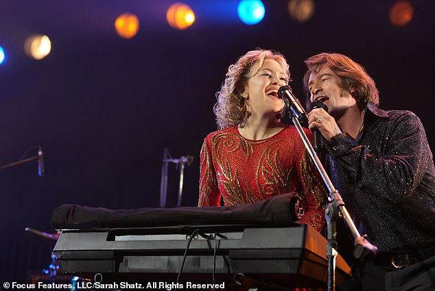 The actress has earned her second Oscar nomination for her role in Song Sung Blue (pictured in the film as Claire Sardina with co-star Hugh Jackman)