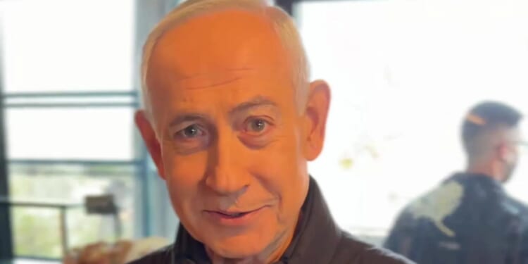 Netanyahu pokes fun at death rumours and AI videos as he points at five fingers & says we’re ‘hitting Iran very hard’