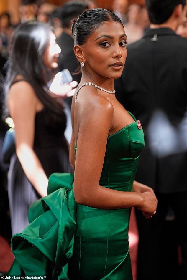 British actress Charithra Chandran also wore a red pin calling for a ceasefire in the Gaza war