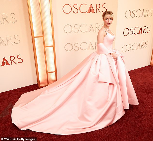 She arrived on the Oscars red carpet for Hollywood's biggest night with dramatic, floor-sweeping train trailing behind her