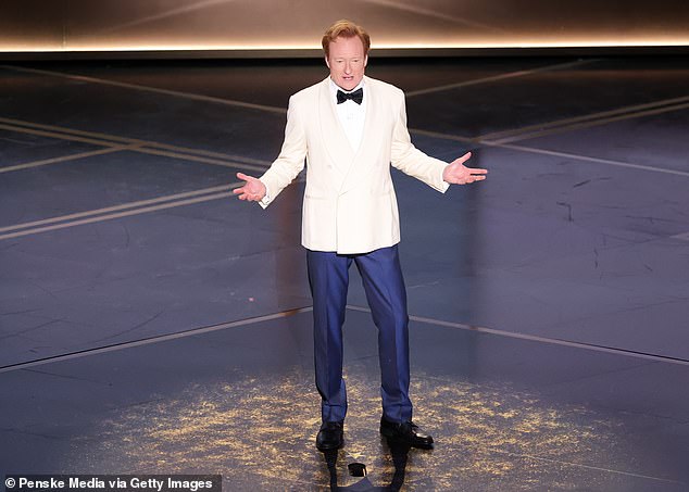 Conan O'Brien, 62, took to the stage tonight, returning to host the show for a second consecutive year after taking over the role from Jimmy Kimmel