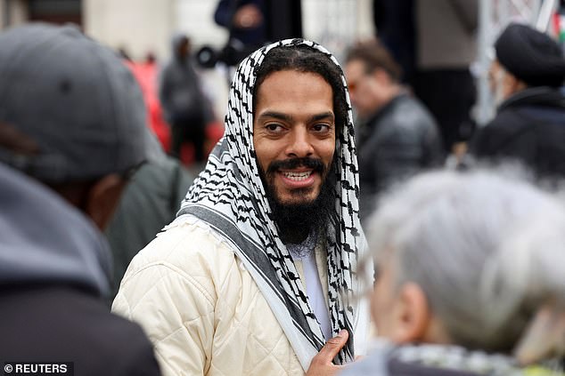 Bobby Vylan - one half of the punk rap duo Bob Vylan - repeated his controversial Glastonbury chant of 'death to the IDF' at the rally