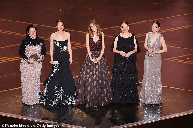 The cast of the beloved 2011 comedy film Bridesmaids reunited on the Oscars stage