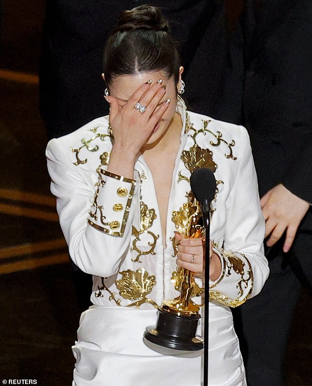 In floods of tears, she shared: 'Growing up, people made fun of me for liking KPop, but now everyone is singing our song and all the Korean lyrics and I'm so proud'