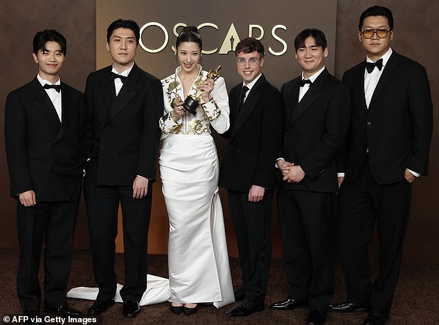 The prize was shared by (from left) Yu Han Lee, Jeong Hoon See, EJAE, Mark Sonnenblick and Hee Dong Nam, who are pictured in the press room after their triumph