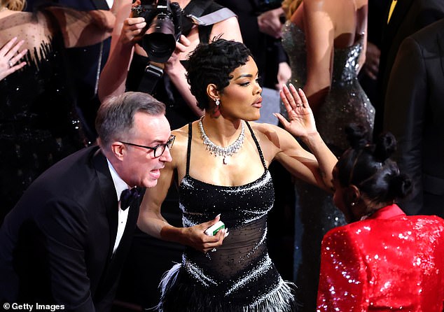 In a viral video filmed in a packed corridor at the Dolby Theatre, Taylor can be seen accusing a man of getting physical with her as she tried to move through the crowd