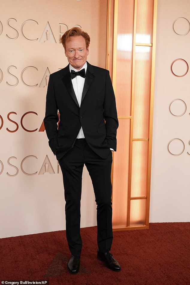 O'Brien soaked up the spotlight in a black tuxedo