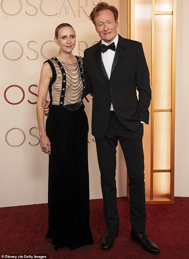 She wore a nude undergarment that - at first glance - made her appear as though she had nothing on under the strings of chains that served as her top