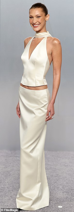 Bella Hadid opted for a chic two-piece ensemble that flashed her toned belly