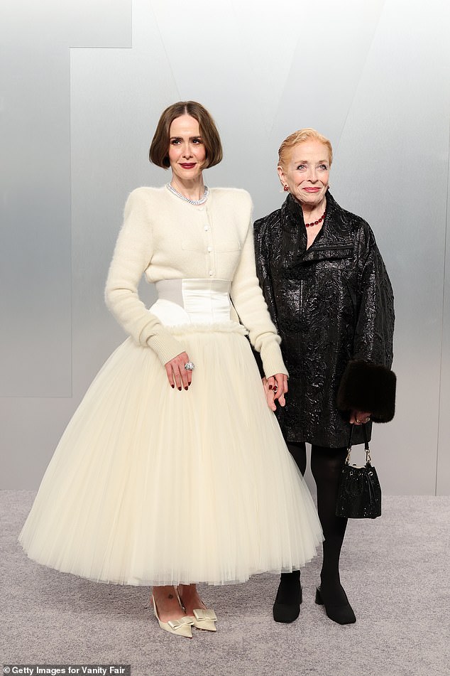 Sarah Paulson wowed in a white, corset-style dress as she attended the bash with her partner Holland Taylor