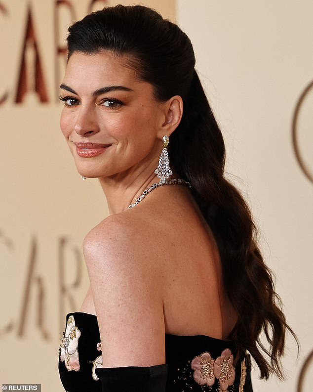 One fan reacted to the sight of her by joking: 'The new face of Anne Hathaway is the mixture of the face of the young Renee Zellweger and Katherine Heigl'