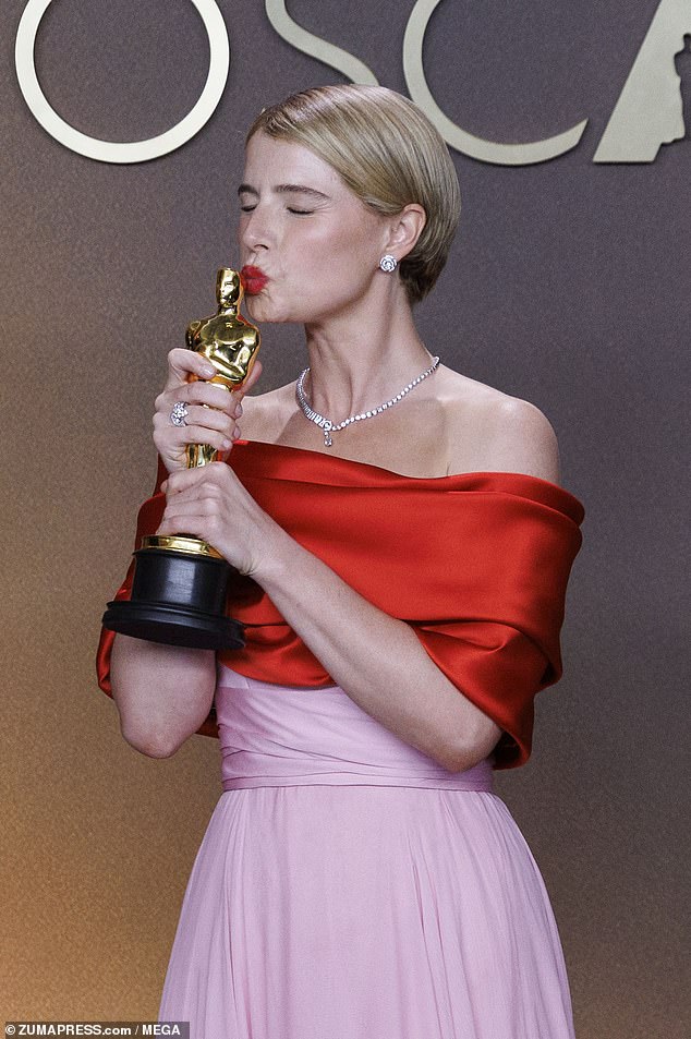 The Hamnet actress, 36, who became the first Irish woman to win the gong on the night, dedicated her award to the 'beautiful chaos of a mother's heart'