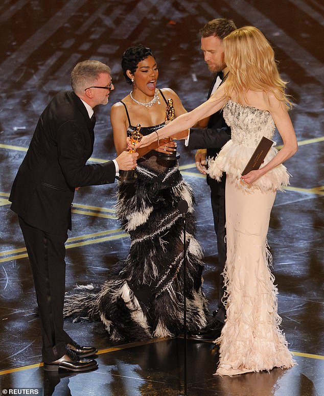 One Battle After Another ended the 2026 Oscars by winning Best Picture as director Paul Thomas Anderson accepted the honor beside Teyana Taylor as the honour was presented by Ewan McGregor and Nicole Kidman (seen left to right)