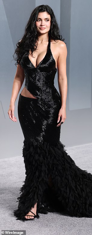 Kylie Jenner swapped one busty look for another, having shunned the main red carpet yet making a statement at Vanity Fair