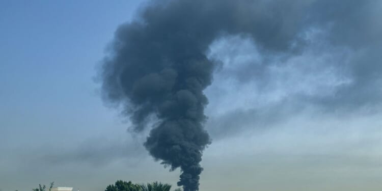 Dubai airport flights suspended after terrifying Iranian drone strike sparks fire and ‘please don’t travel’ warning