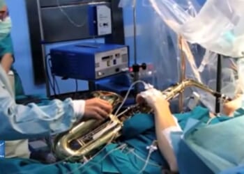 Musician who played saxophone during 12-hour brain tumour op dies aged 38 as tributes paid to 'shining example'