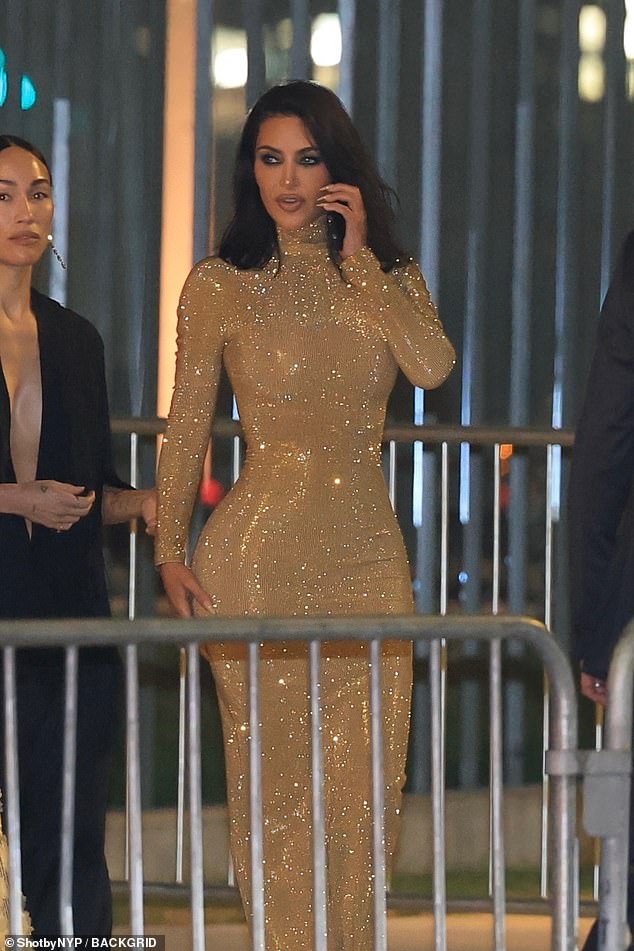 Kim was later spotted on the phone as she exited the bash