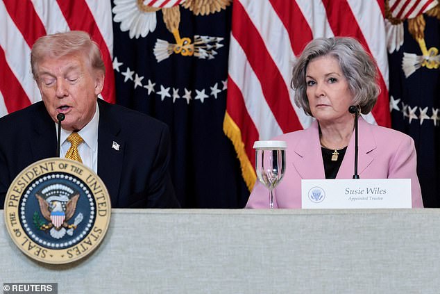White House Chief of Staff Susie Wiles (right) sported a breast cancer pink blazer at an event with President Donald Trump (left) directly after he publicly shared her breast cancer diagnosis