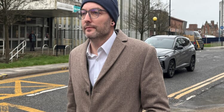 Doctor, 38, charged with string of sex offences against 38 patients including abusing child under 13 appears in court
