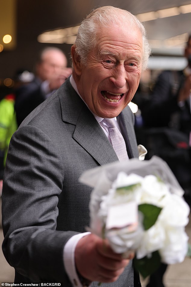 The King appeared in good spirits as he greeted well-wishers outside Aviva Studios
