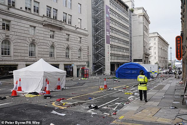 Police at the scene in Water Street near the Liver Building in Liverpool after the incident in May
