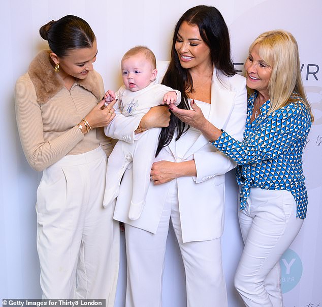 The image was a rare glimpse into Michelle's private life... but Palma's grandmother Carol Wright - seen here with daughters Natalya and Jess, and Natalya's baby Presley - has been notably absent from any pictures of Palma