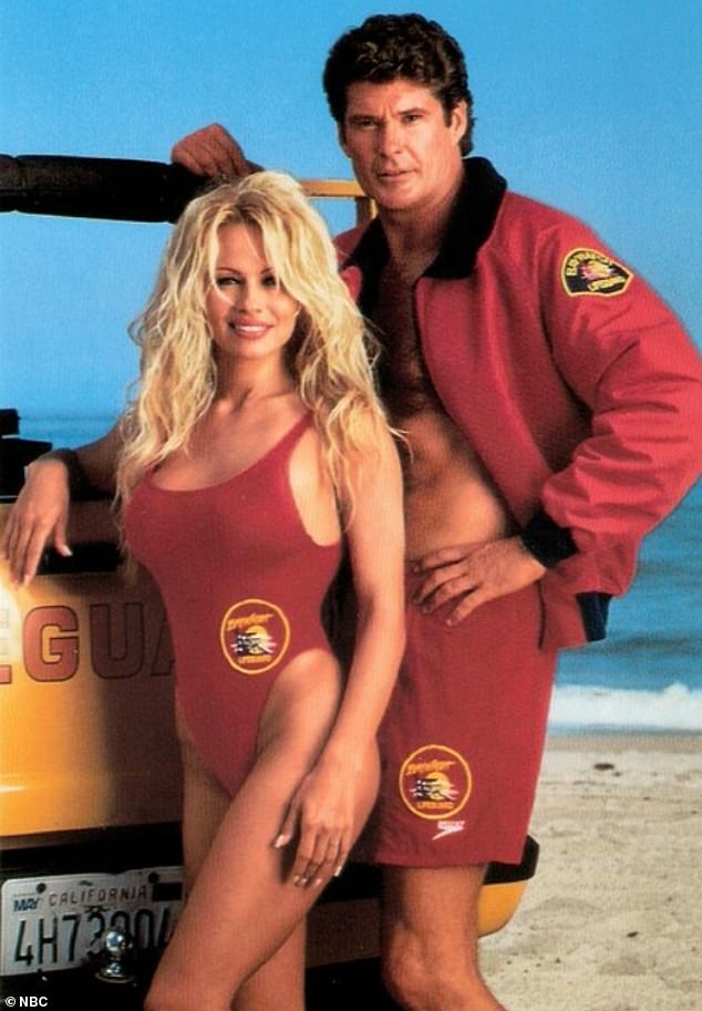 Beck, 24, and Belkin, 23, got to work as they hit the sand, showing off their beach bodies and following in the footsteps of OG icons David Hasselhoff and Pamela Anderson ¿ pictured