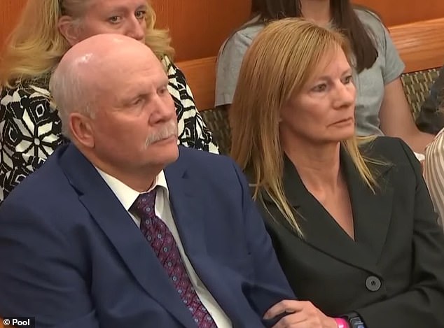 Eric's father Eugene remained stoic and bowed his head while the verdict was read out in court