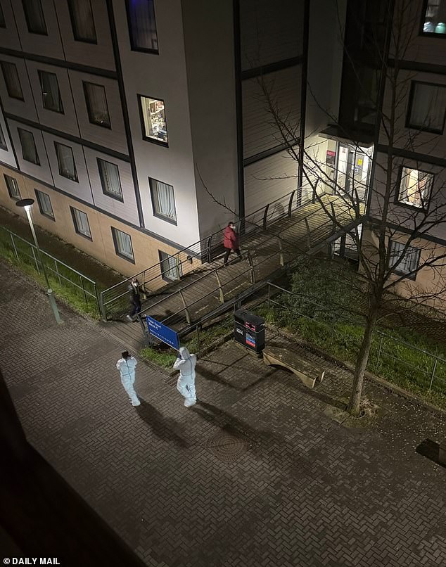 Health inspectors going into Tyler Block at the University of Kent in Canterbury on Sunday night
