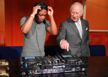 Moment King Charles, 77, has a go at DJing