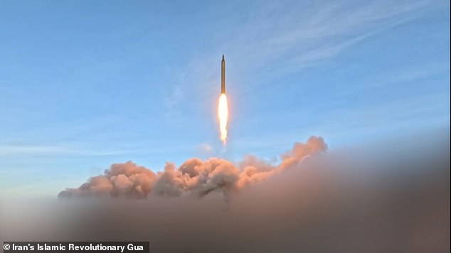 In total the graphic lists 15 companies which could be targeted. Pictured: A Video grab taken from handout footage released by the Iranian Revolutionary Guard Corps (IRGC) on March 12, 2026, shows what it says was the 'launch of wave #41 of Iranian missiles'